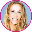Portrait of a smiling woman with long blonde hair, light blue eyes, and a blue background, framed by a pink circular border—embodying confidence in cybersecurity and fraud prevention.